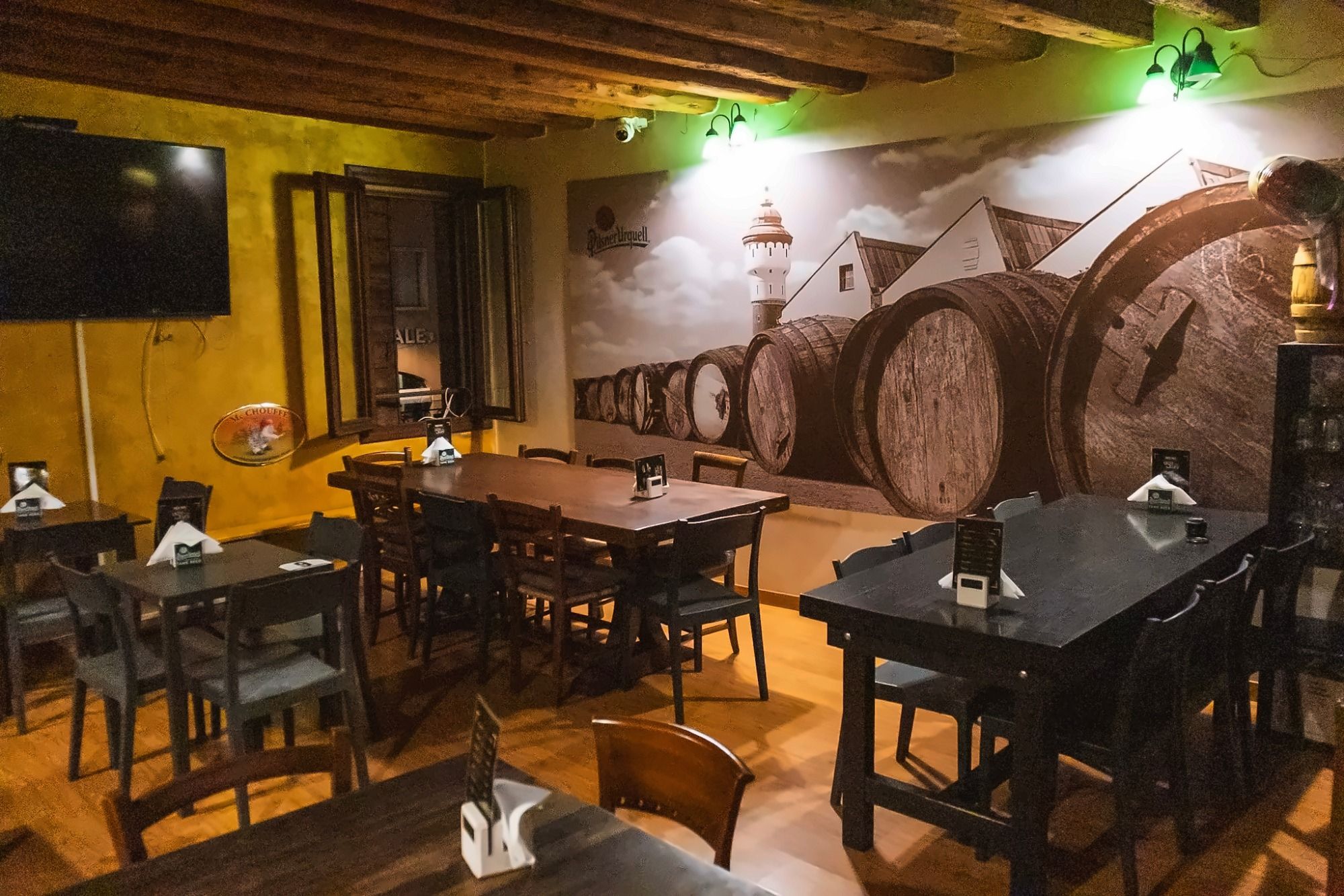 Sala dell'Oste Scuro con scritta Pilsner Urquell Tank Beer Este